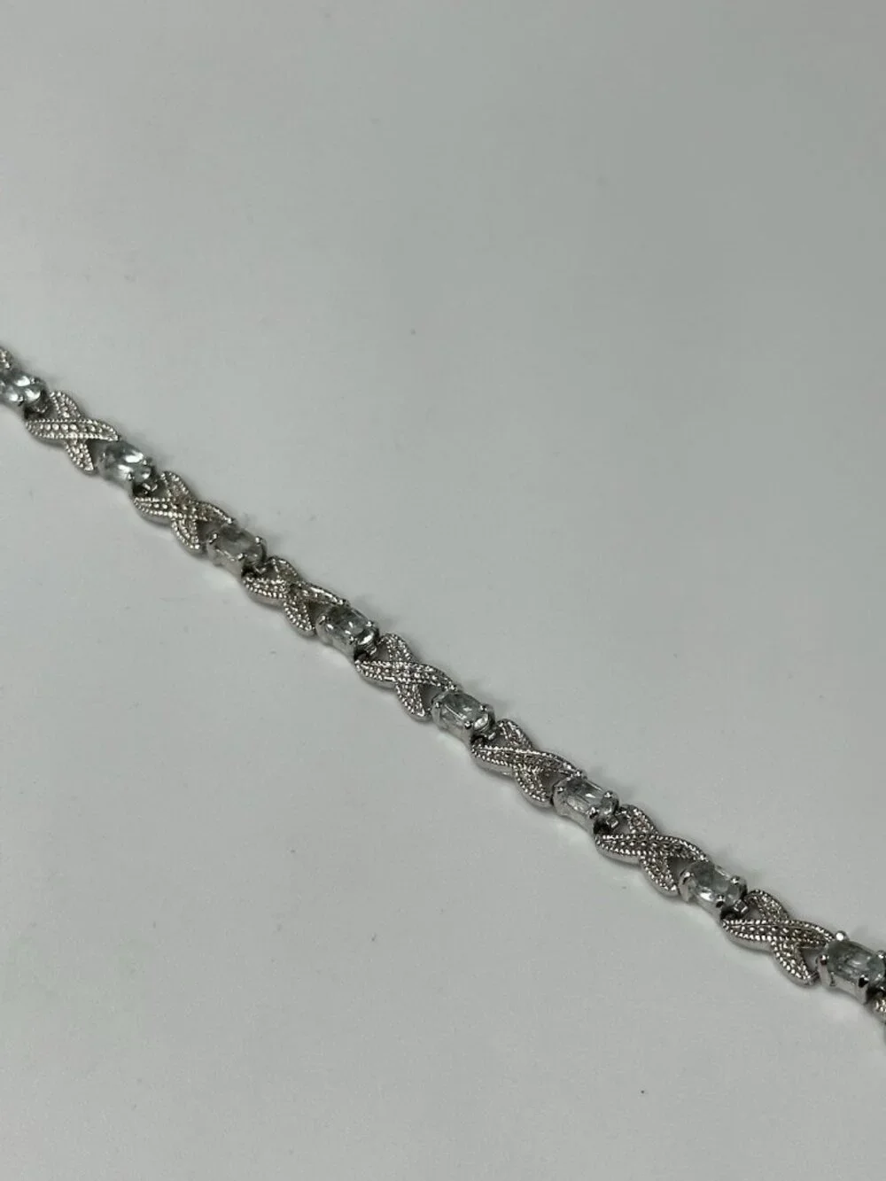 Infinity Link Tennis Bracelet Sterling Silver Blue Oval Stones 8 Grams 7.25”